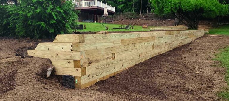Stone retaining wall project by Super Green Landscaping - photo 1 of 4