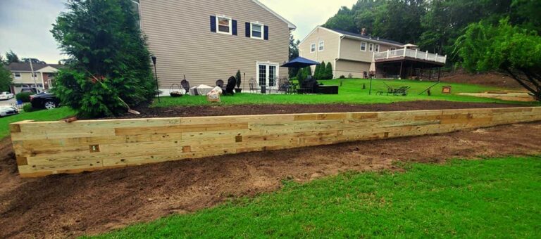Stone retaining wall project by Super Green Landscaping - photo 3 of 4